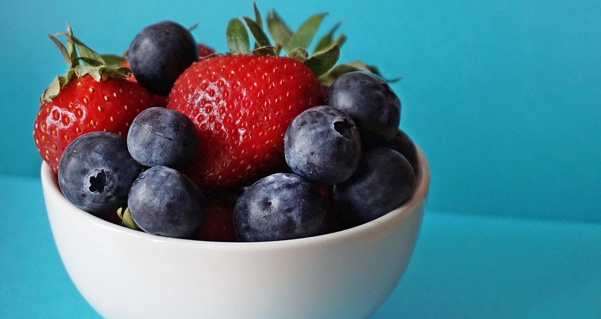 blueberries and strawberries in a bowl