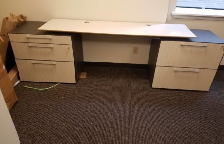 2 filing cabinets with floating table top