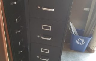 tall black file cabinet
