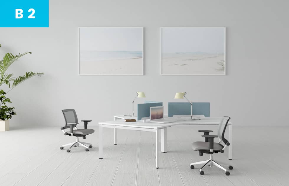 white office workspace for multiple employees
